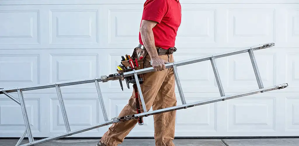 Garage door repair technician arriving with tools and ladder in Fresno, CA