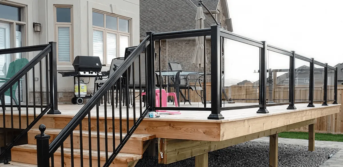 Handrail installation on a deck staircase for safety and code compliance in Fresno, CA