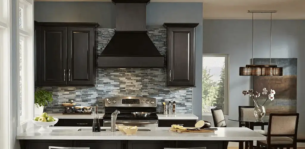Kitchen cabinet painting and refinishing in a modern kitchen in Fresno, CA